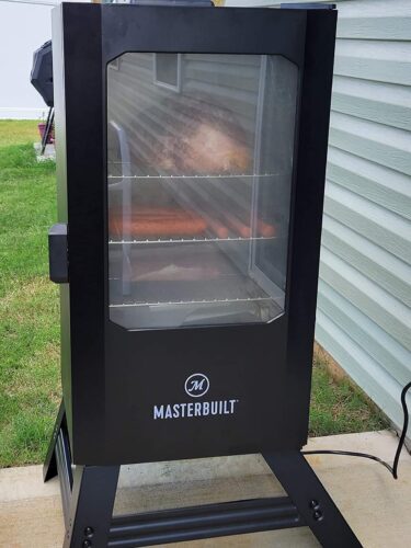 Masterbuilt 30-Inch Digital Electric Vertical Smoker – 710 Sq In Cooking Area, Side Wood Chip Loader, Digital Controls, Chrome Racks & Leg Kit – Model MB20070421, Black photo review